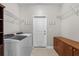 Laundry room with washer, dryer, and storage at 409 Carrick Loop, Longs, SC 29568