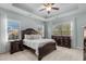 Spacious main bedroom with ceiling fan and large windows at 409 Carrick Loop, Longs, SC 29568