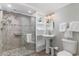 Bathroom with walk-in shower, pedestal sink, and shelving at 4103 N Ocean Blvd. # 504, North Myrtle Beach, SC 29582