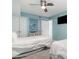 Bright bedroom featuring two beds, closet space, and a wall-mounted TV at 4103 N Ocean Blvd. # 504, North Myrtle Beach, SC 29582