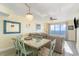 Bright dining area with glass-top table and ocean view at 4103 N Ocean Blvd. # 504, North Myrtle Beach, SC 29582