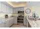 Well-equipped kitchen featuring modern appliances, granite countertops, and stylish finishes throughout at 4103 N Ocean Blvd. # 504, North Myrtle Beach, SC 29582