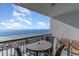 Balcony with table and chairs, offering stunning ocean views at 4103 N Ocean Blvd. # 504, North Myrtle Beach, SC 29582