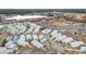 Community aerial view of the neighborhood's layout near commercial buildings with manicured landscaping and orderly streets at 412 Chesterfield Ct., Myrtle Beach, SC 29577