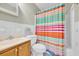 Bathroom with multicolored striped shower curtain at 412 Chesterfield Ct., Myrtle Beach, SC 29577