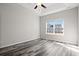 Bright bedroom with vinyl plank flooring and a ceiling fan at 4204 Summitt Trail, Myrtle Beach, SC 29579