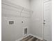 Laundry room with built-in shelving and a utility sink at 4204 Summitt Trail, Myrtle Beach, SC 29579