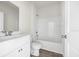 White bathroom with bathtub and vanity at 426 Toledo St., Conway, SC 29526