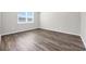 Well-lit bedroom featuring hardwood floors and window at 426 Toledo St., Conway, SC 29526