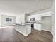 Modern kitchen featuring granite counters and white cabinets at 426 Toledo St., Conway, SC 29526