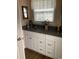 Bathroom with granite countertop and white cabinets at 430 Long Lake Circle, Conway, SC 29527