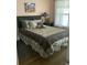 Cozy bedroom with a queen-size bed and tasteful decor at 430 Long Lake Circle, Conway, SC 29527