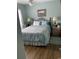 Bright bedroom featuring a queen bed, light walls, and hardwood floors at 430 Long Lake Circle, Conway, SC 29527