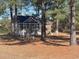 View of a small storage shed in the backyard at 430 Long Lake Circle, Conway, SC 29527