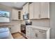 This kitchen showcases white cabinets, stainless appliances, and quartz countertops with stylish hardware at 45 Northbrook Dr, Murrells Inlet, SC 29576
