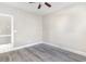 Simple bedroom with ceiling fan and access to a bathroom at 4705 Wild Iris Dr. # 105, Myrtle Beach, SC 29577