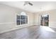 Bright dining room featuring hardwood floors and an arched window at 4705 Wild Iris Dr. # 105, Myrtle Beach, SC 29577