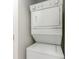 Stackable white washer and dryer in a closet at 4705 Wild Iris Dr. # 105, Myrtle Beach, SC 29577