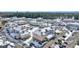 Wide aerial view of a snow-covered condo community with numerous buildings and parking at 4846 Carnation Circle # 203, Myrtle Beach, SC 29577