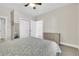 Bedroom with queen bed, dresser, and double-door closet at 4846 Carnation Circle # 203, Myrtle Beach, SC 29577