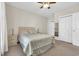 Spacious bedroom with queen bed, ample closet space, and ceiling fan at 4846 Carnation Circle # 203, Myrtle Beach, SC 29577