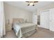 Bedroom with neutral walls, a queen-sized bed, and bedside lamps at 4846 Carnation Circle # 203, Myrtle Beach, SC 29577