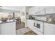 Kitchen with white cabinets, granite countertops, and stainless steel appliances at 4846 Carnation Circle # 203, Myrtle Beach, SC 29577