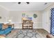 Cozy living room featuring a decorative rug, stylish furniture, and natural light at 4846 Carnation Circle # 203, Myrtle Beach, SC 29577