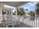 Relaxing balcony with seating area and neighborhood view at 4919 Cinzia Ln. # 6-B, North Myrtle Beach, SC 29582