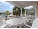 White table and chairs on balcony overlooking community at 4919 Cinzia Ln. # 6-B, North Myrtle Beach, SC 29582