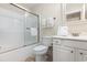 Clean bathroom with shower/tub combo and white vanity at 4919 Cinzia Ln. # 6-B, North Myrtle Beach, SC 29582