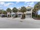 Townhome community with palm trees and attached garages at 4919 Cinzia Ln. # 6-B, North Myrtle Beach, SC 29582