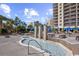 Resort-style pool area with water features and comfortable seating at 4919 Cinzia Ln. # 6-B, North Myrtle Beach, SC 29582