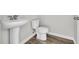 Clean bathroom with pedestal sink and toilet at 545 Goldstar St., Conway, SC 29526