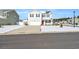 Two-story house with white siding and red front door in winter at 545 Goldstar St., Conway, SC 29526