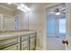 Double vanity bathroom with a view into a light blue bedroom at 55 Pineberry Dr., Georgetown, SC 29440