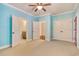 Light and airy bedroom with light blue walls and ample closet space at 55 Pineberry Dr., Georgetown, SC 29440