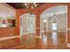 Elegant dining room with hardwood floors and a chandelier at 55 Pineberry Dr., Georgetown, SC 29440