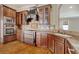 Kitchen boasts granite countertops and dark wood cabinets at 55 Pineberry Dr., Georgetown, SC 29440