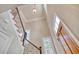 Elegant wooden staircase with wrought iron railing at 55 Pineberry Dr., Georgetown, SC 29440