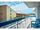 Balcony overlooking pool and neighboring building at 5511 N Ocean Blvd. # 309, Myrtle Beach, SC 29577