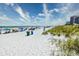 Expansive sandy beach with ocean views and umbrellas at 5511 N Ocean Blvd. # 309, Myrtle Beach, SC 29577