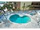 Relaxing kidney-shaped outdoor pool with surrounding lounge chairs at 5511 N Ocean Blvd. # 309, Myrtle Beach, SC 29577