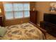 Spacious bedroom with a large window and plenty of closet space at 601 N Hillside Dr. # 4235, North Myrtle Beach, SC 29582