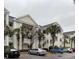 Attractive condo building with ample parking and landscaping at 601 N Hillside Dr. # 4235, North Myrtle Beach, SC 29582