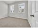 Spacious bedroom with neutral walls and carpet flooring at 708 Canton St., Conway, SC 29526