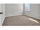 Simple bedroom with carpet flooring and large window at 708 Canton St., Conway, SC 29526