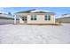 Back of house with covered patio and snow-covered yard at 708 Canton St., Conway, SC 29526