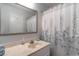 Guest bathroom with single sink vanity and shower/tub combo at 713 N Ocean Blvd. # 204, Surfside Beach, SC 29575