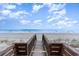 Wooden walkway leading to sandy beach at 713 N Ocean Blvd. # 204, Surfside Beach, SC 29575